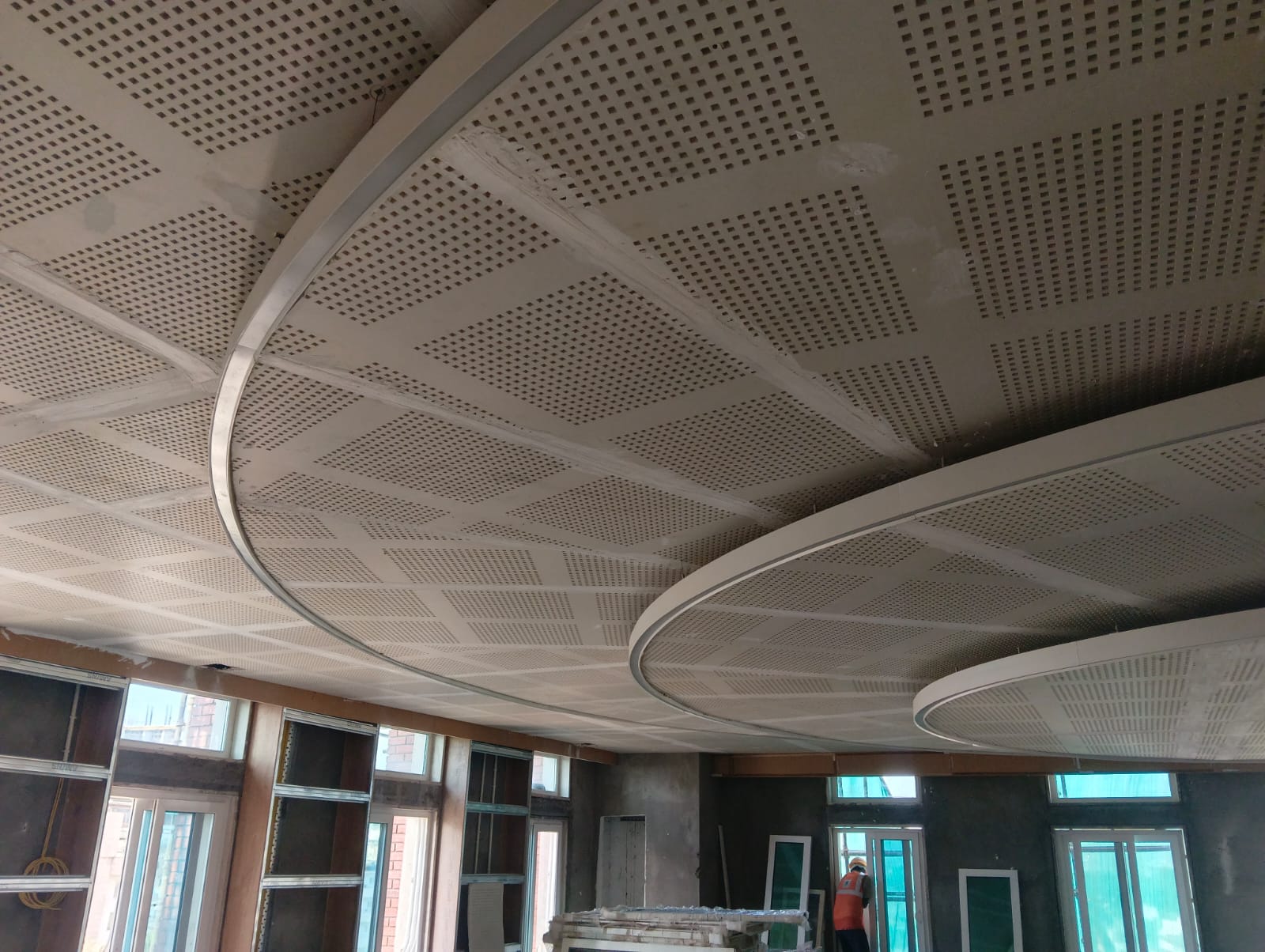 Curved acoustic ceiling — false ceiling MEP integration