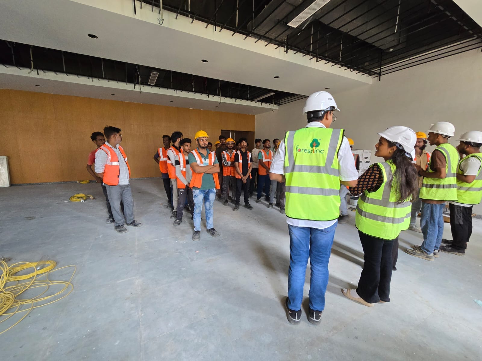 Site safety briefing with contractor team